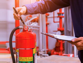 Technical servicing a fire extinguisher