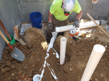 S.A. Comunale workers installing a piping underground system
